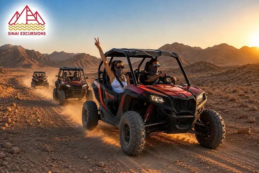 Dune buggy racing across desert dunes near Hurghada.